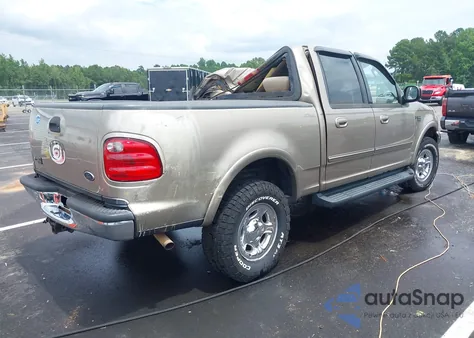 2003 Ford F-150 Lariat/Xlt z USA, uszkodzony, nr VIN 1FTRW08613KA21012
